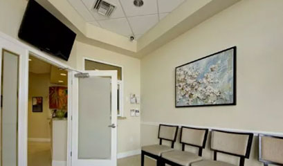 cape coral team in front of the office building